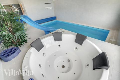 Nyt varmen i boblebadet i luksushus nr. 516 i Vestjylland