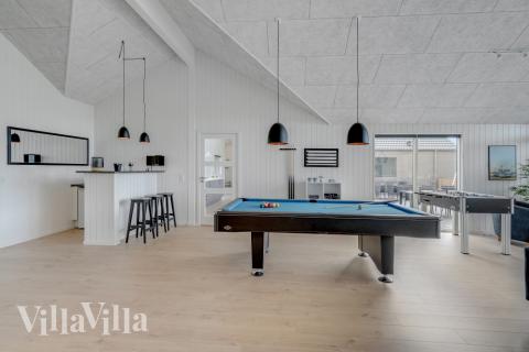 Konkurrer i feriehusets aktivitetsrom når dere besøker luksushus nr. 516 i Vestjylland.