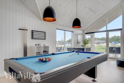 I tillegg til alle aktivitetsmulighetene i husets bassengavdeling, kan du også spille biljard, bordtennis og dart i luksushus nr. 516