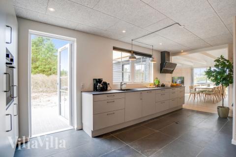 Kjøkkenet i luksushus nr. 518 er fullt utstyrt så dere lett kan lage mat til 14 personer.