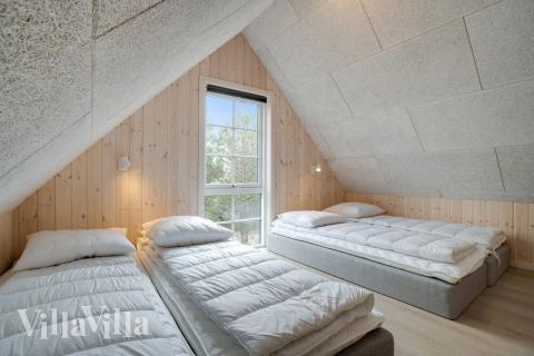 Noen av de 14 soveplassene i luksushus nr. 518 finnes på hems