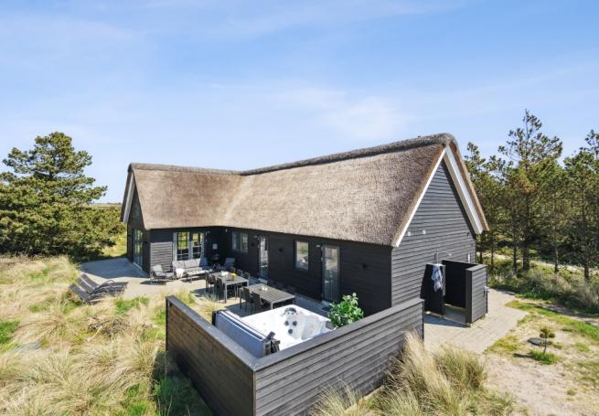 Dette lekre huset med spa, nr. 518, med plass til 14 personer, ligger i Vestjylland