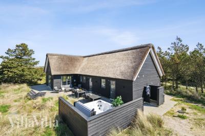 Dette lekre huset med spa, nr. 518, med plass til 14 personer, ligger i Vestjylland