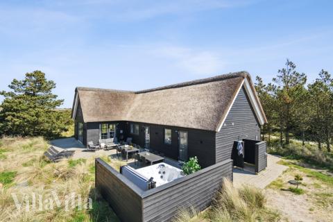 Dette lekre huset med spa, nr. 518, med plass til 14 personer, ligger i Vestjylland