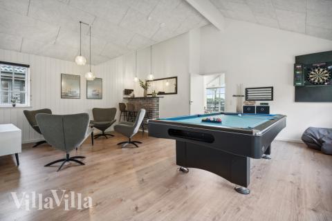 Luksushus nr. 520 til 18 personer tilbyr et stort aktivitetsrom med bl.a. biljard og dart