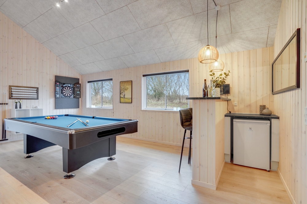 I tillegg til alle aktivitetsmulighetene i husets bassengavdeling, kan du også spille biljard, bordtennis og dart i luksushus nr. 524