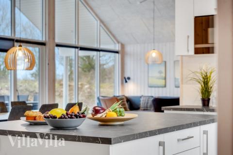 Kjøkkenet i luksushus nr. 524 er fullt utstyrt så dere lett kan lage mat til 16 personer.