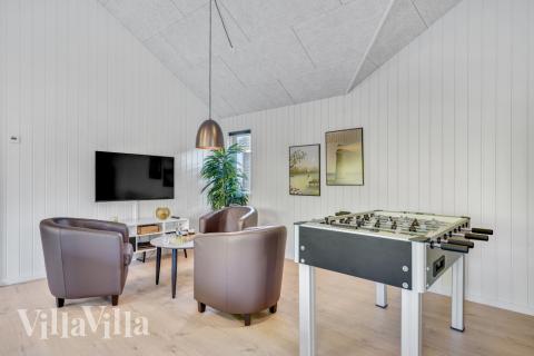 Konkurrer i feriehusets aktivitetsrom når dere besøker luksushus nr. 536 i Vestjylland.