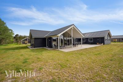 Dette lekre huset med svømmebasseng, nr. 535, med plass til 20 personer, ligger i Vestjylland