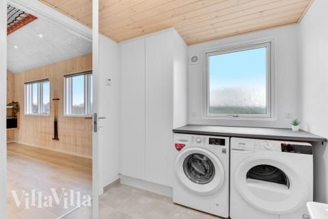 Det romslige inngangspartiet til luksushus nr. 539 i Limfjorden