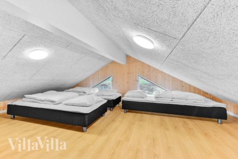 Noen av de 14 soveplassene i luksushus nr. 539 finnes på hems