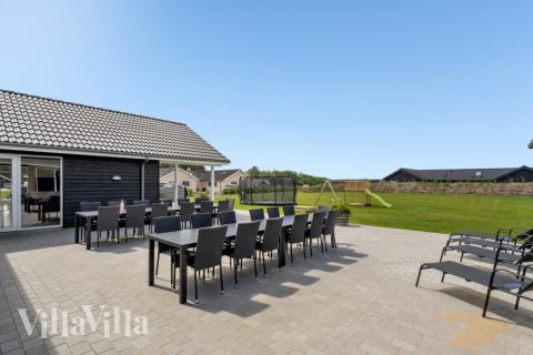 På terrassen i feriehus nr. 542 er det plass til 26 personer.