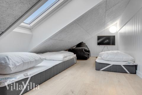 Noen av de 14 soveplassene i luksushus nr. 549 finnes på hems