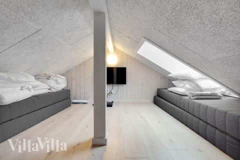 Noen av de 14 soveplassene i luksushus nr. 550 finnes på hems