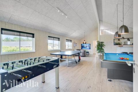 I tillegg til alle aktivitetsmulighetene i husets bassengavdeling, kan du også spille biljard, bordtennis og dart i luksushus nr. 547