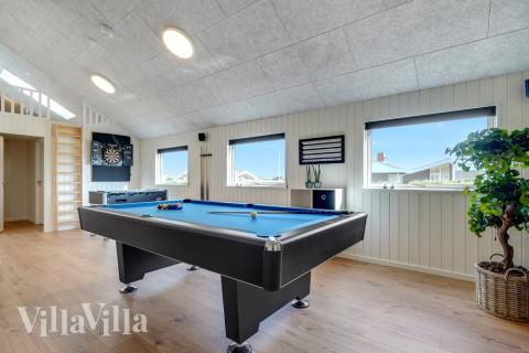 Konkurrer i feriehusets aktivitetsrom når dere besøker luksushus nr. 558 i Vestjylland.