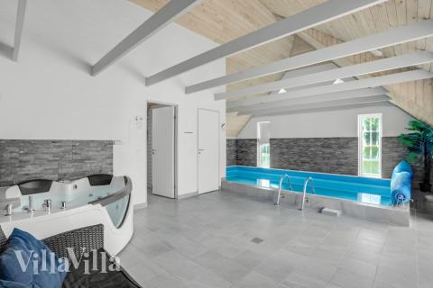 Nyt varmen i boblebadet i luksushus nr. 572 i Vestjylland