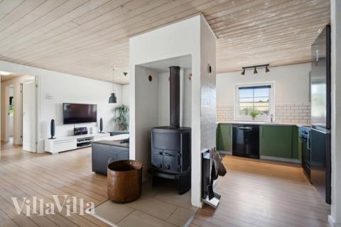 Oppholdsrom med plass til 12 i luksushus nr. 572.