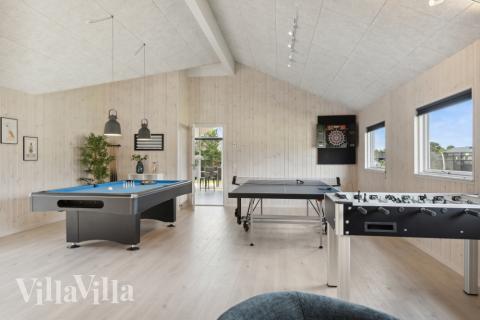 I tillegg til alle aktivitetsmulighetene i husets bassengavdeling, kan du også spille biljard, bordtennis og dart i luksushus nr. 577