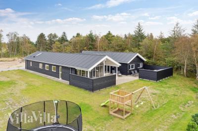 Dette lekre huset med svømmebasseng, nr. 577, med plass til 18 personer, ligger i Nordjylland