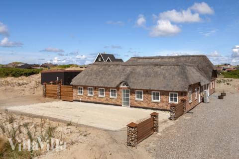 Dette lekre huset med svømmebasseng, nr. 580, med plass til 16 personer, ligger i Vestjylland