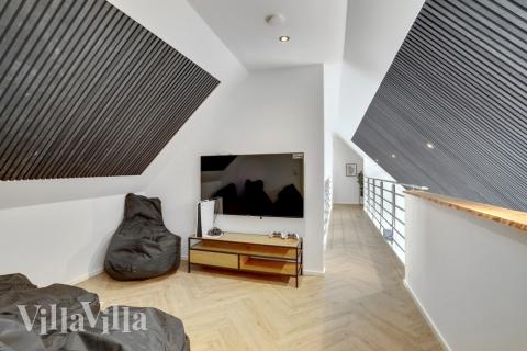 Oppholdsrom med plass til 16 i luksushus nr. 580.