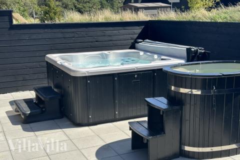 Nyt varmen i boblebadet i luksushus nr. 601 i Sydjylland