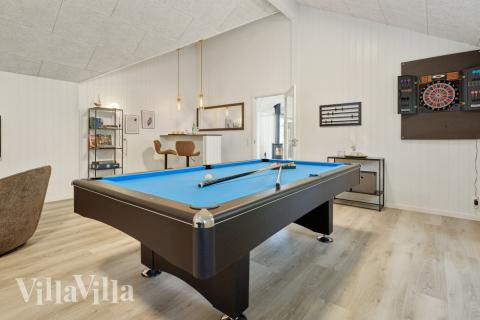 Konkurrer i feriehusets aktivitetsrom når dere besøker luksushus nr. 593 i Sydjylland.