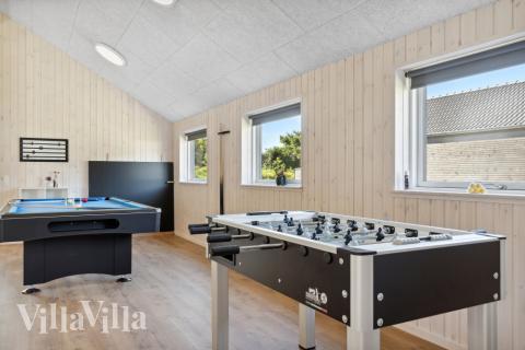 Konkurrer i feriehusets aktivitetsrom når dere besøker luksushus nr. 597 i Sydjylland.