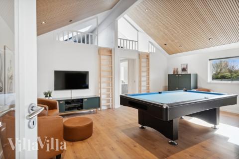 Luksushus nr. 584 til 14 personer tilbyr et stort aktivitetsrom med bl.a. biljard og dart