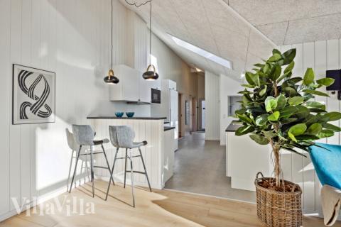 Oppholdsrom med plass til 12 i luksushus nr. 753.