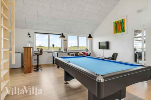 I tillegg til alle aktivitetsmulighetene i husets bassengavdeling, kan du også spille biljard, bordtennis og dart i luksushus nr. 548