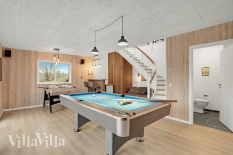 I tillegg til alle aktivitetsmulighetene i husets bassengavdeling, kan du også spille biljard, bordtennis og dart i luksushus nr. 603