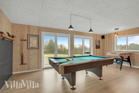 Luksushus nr. 603 til 12 personer tilbyr et stort aktivitetsrom med bl.a. biljard og dart