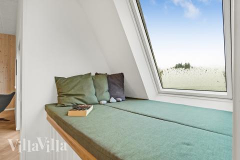 Oppholdsrom med plass til 12 i luksushus nr. 603.