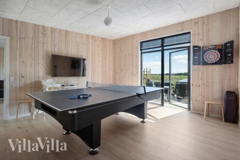 I tillegg til alle aktivitetsmulighetene i husets bassengavdeling, kan du også spille biljard, bordtennis og dart i luksushus nr. 604