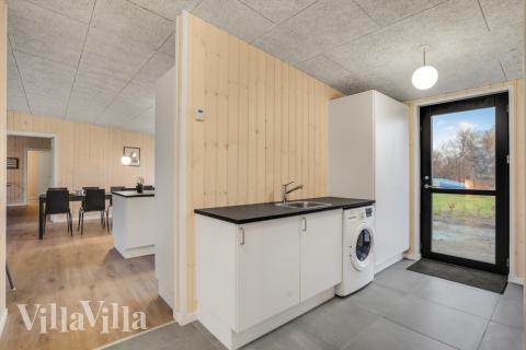 Det romslige inngangspartiet til luksushus nr. 604 i Østjylland