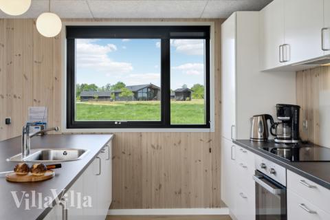 Kjøkkenet i luksushus nr. 604 er fullt utstyrt så dere lett kan lage mat til 16 personer.