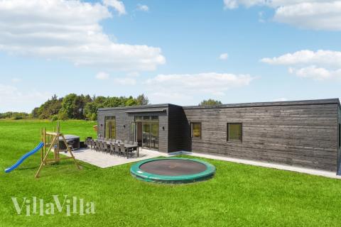 Dette lekre huset med spa, nr. 604, med plass til 16 personer, ligger i Østjylland