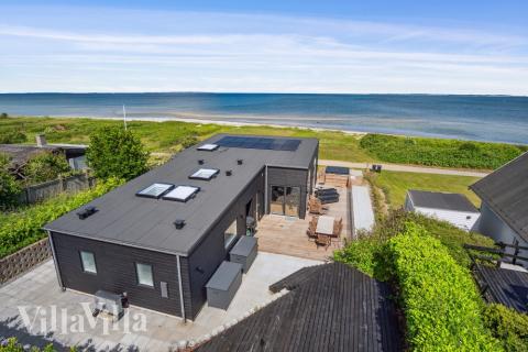 Dette lekre huset med spa, nr. 606, med plass til 6 personer, ligger i Østjylland