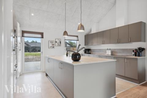 Kjøkkenet i luksushus nr. 608 er fullt utstyrt så dere lett kan lage mat til 26 personer.