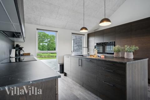 Kjøkkenet i luksushus nr. 611 er fullt utstyrt så dere lett kan lage mat til 20 personer.