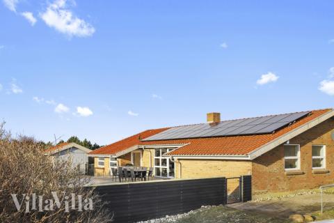 Dette lekre huset med svømmebasseng, nr. 613, med plass til 8 personer, ligger i Vestjylland