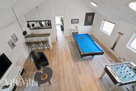 I tillegg til alle aktivitetsmulighetene i husets bassengavdeling, kan du også spille biljard, bordtennis og dart i luksushus nr. 614