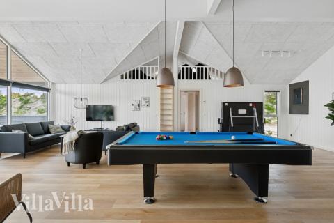 I tillegg til alle aktivitetsmulighetene i husets bassengavdeling, kan du også spille biljard, bordtennis og dart i luksushus nr. 615