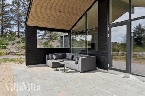 Nyt en grillkveld på terrassen i luksushus nr. 615 i Nordjylland