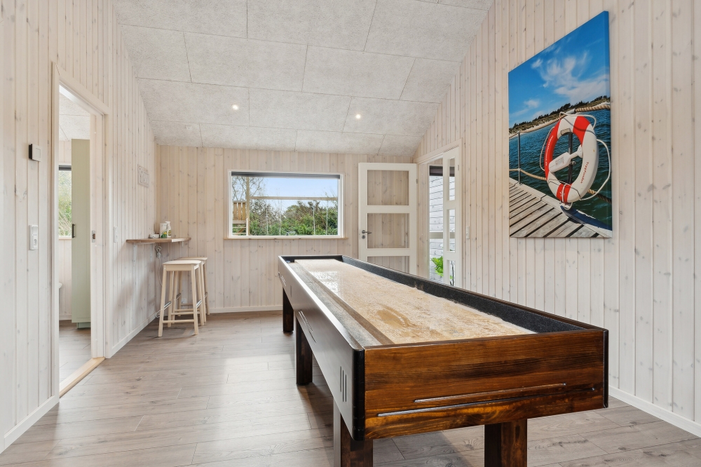 I tillegg til alle aktivitetsmulighetene i husets bassengavdeling, kan du også spille biljard, bordtennis og dart i luksushus nr. 628
