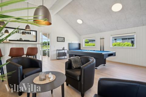 Konkurrer i feriehusets aktivitetsrom når dere besøker luksushus nr. 633 i Sydjylland.