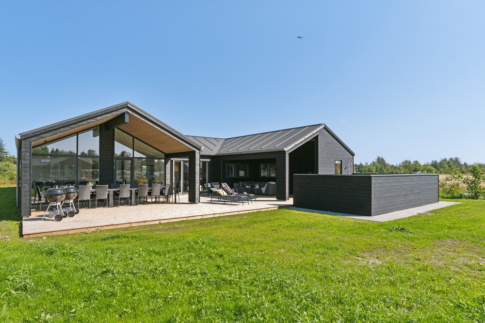 Dette lekre huset med svømmebasseng, nr. 634, med plass til 18 personer, ligger i Nordjylland