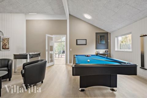 I tillegg til alle aktivitetsmulighetene i husets bassengavdeling, kan du også spille biljard, bordtennis og dart i luksushus nr. 638